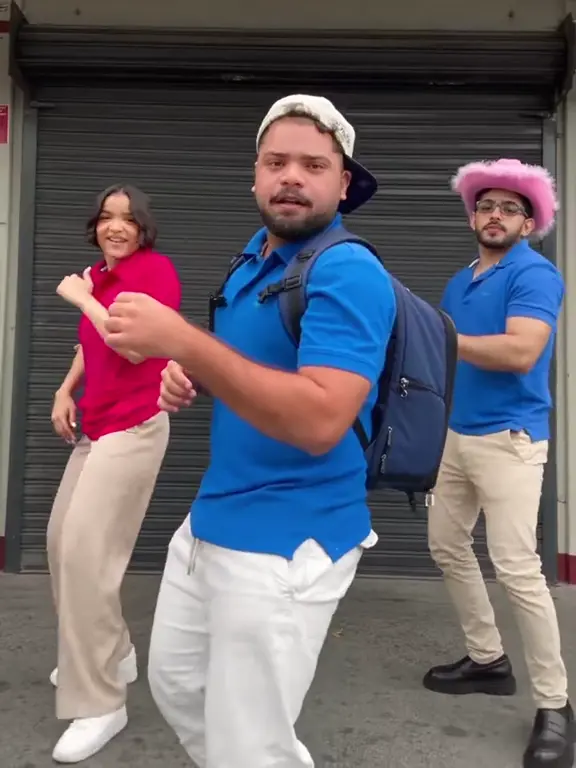 Pavement Dance Crew: Three dancers take a small step toward the camera in a coordinated street routine.